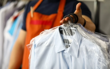 clothes-dry-cleaning-service-worker-returning-shirts-customer-1-ptZHT97Htk.jpg